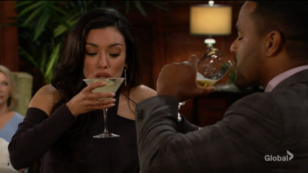 Audra and Nate take a sip of their drinks.