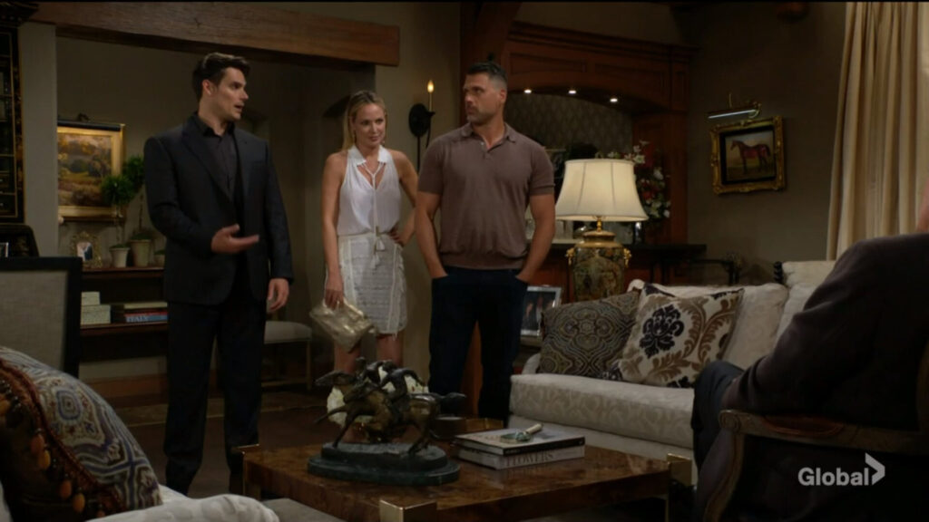 Adam gestures to Nick and Sharon as he talks with Victor.