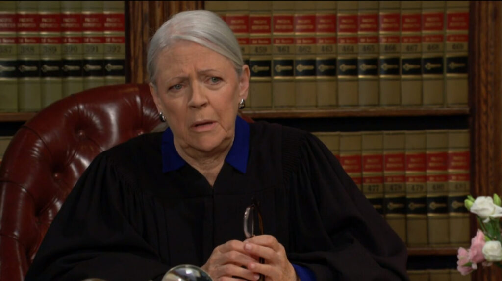 The judge talks to Phyllis.