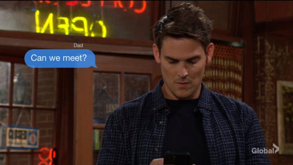 Adam sends a text message to Victor.