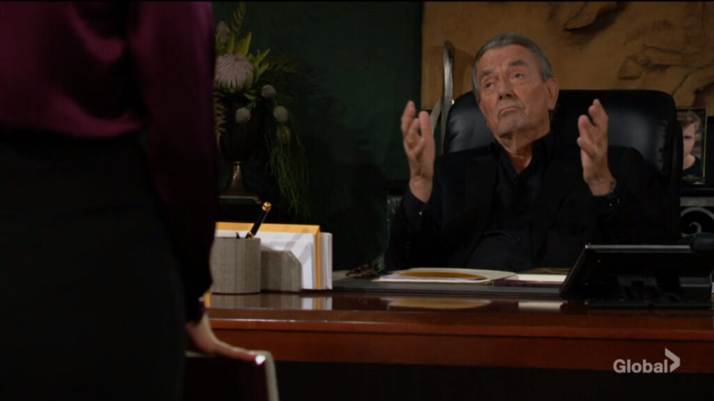 Victor gestures as he talks to Victoria.