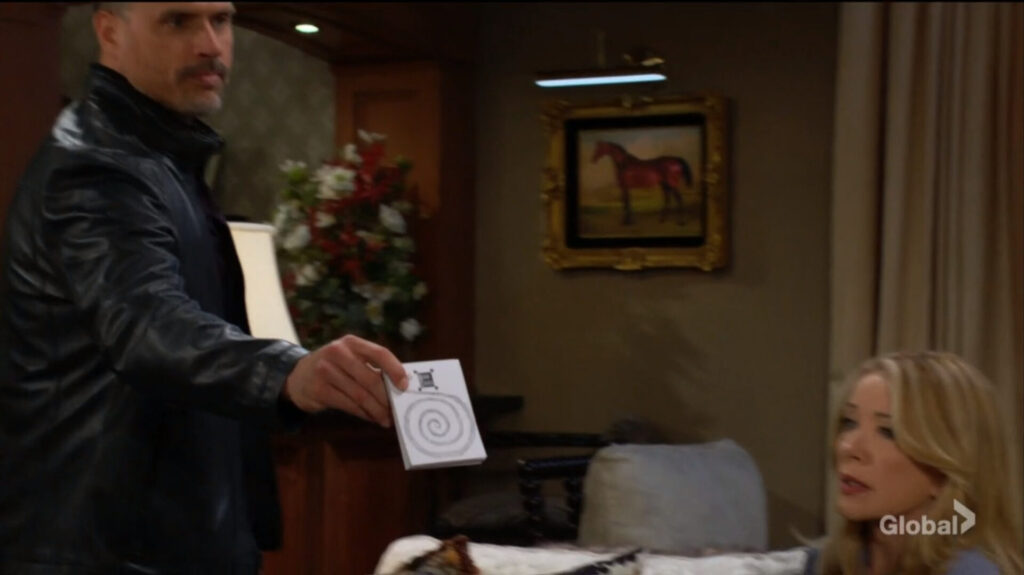 Nick presents the notepad to Victor.