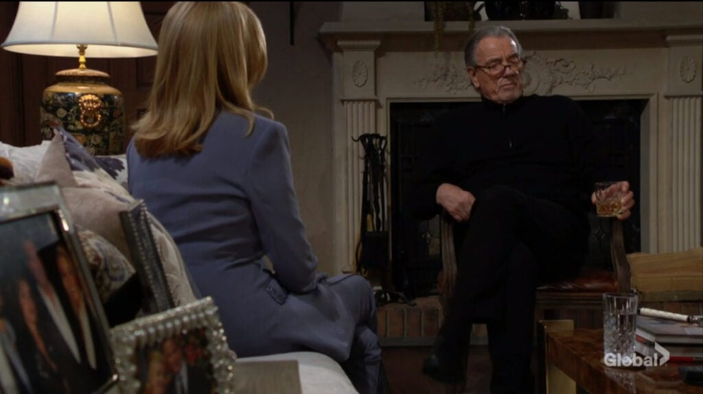 Nikki and Victor Newman sit and talk.
