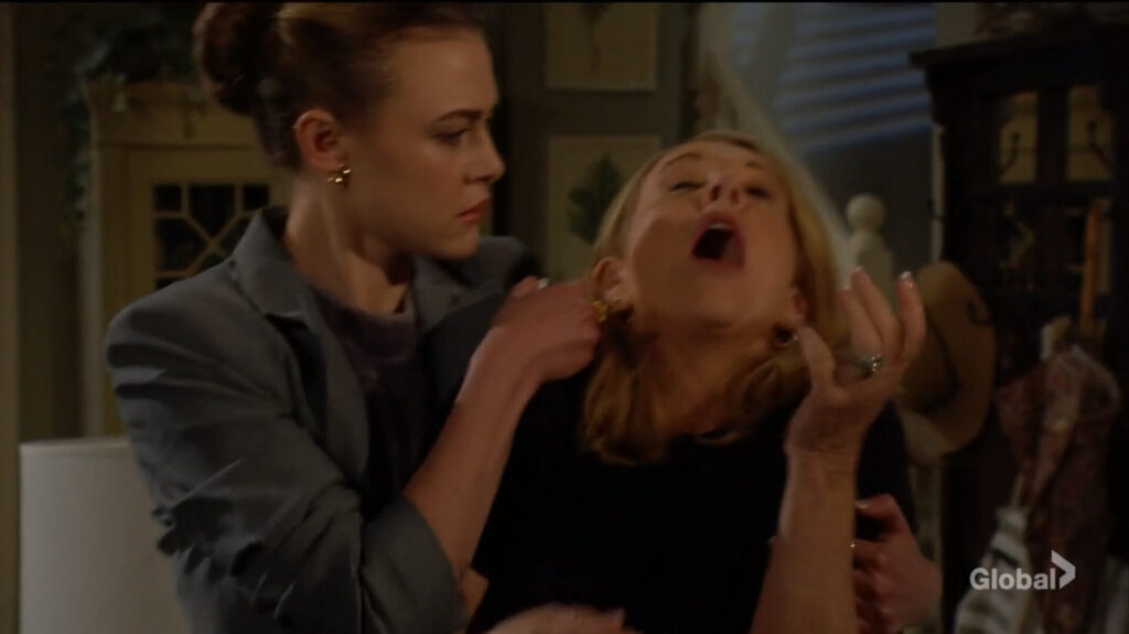 Claire injects Nikki's neck with a syringe.