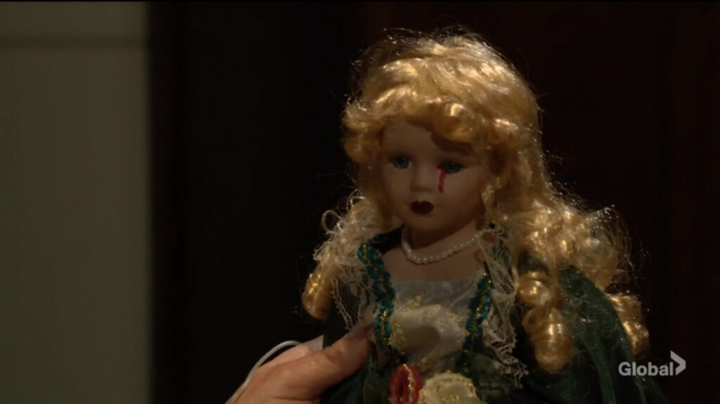 A doll with blood running from its left eye.