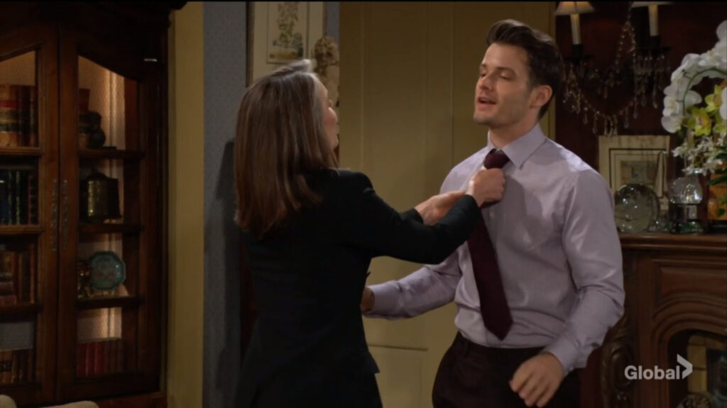 Diane Abbott-Jenkins adjusts Kyle Abbott's tie.