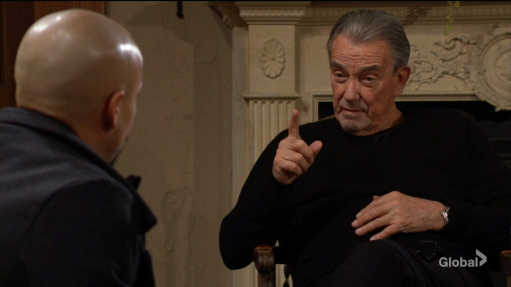 Victor holds up a finger as he talks to Devon.