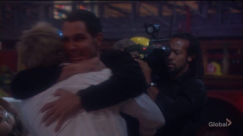 Brad hugs JT.