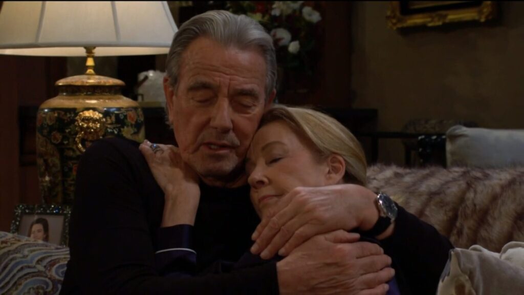 Victor comforts Nikki and cuddles her.