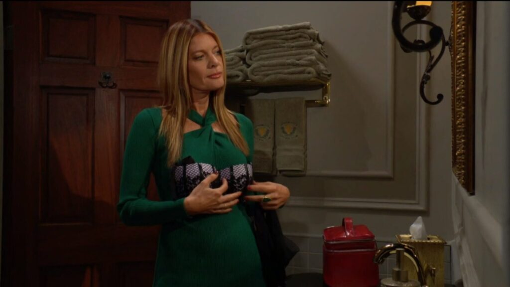 Phyllis tries a bra on for size.