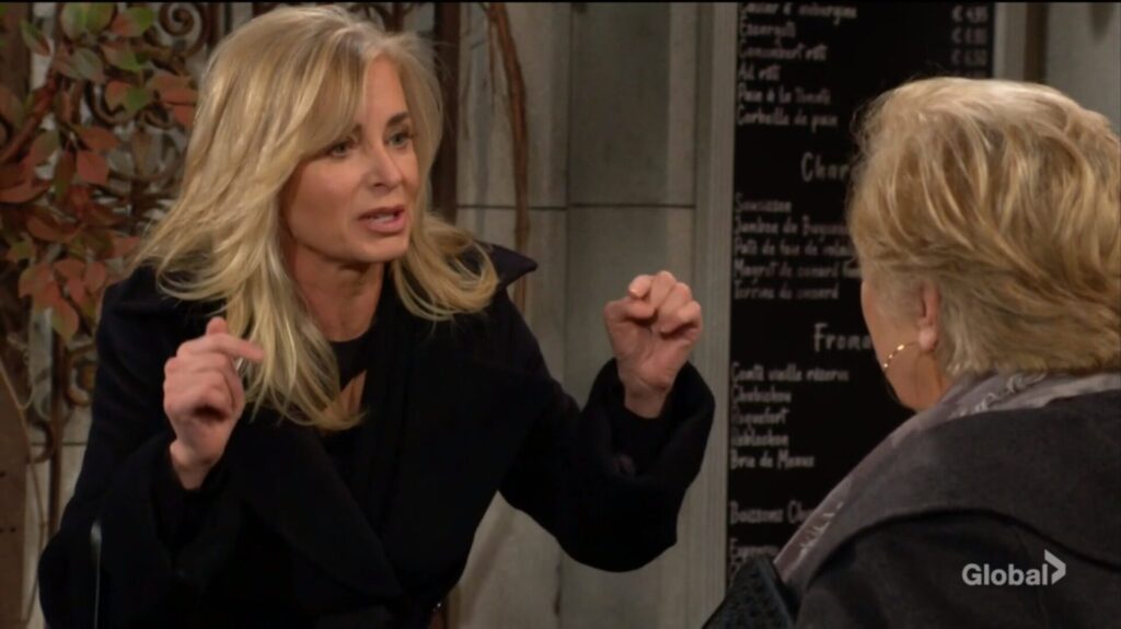 Ashley gestures as she talks to Traci.