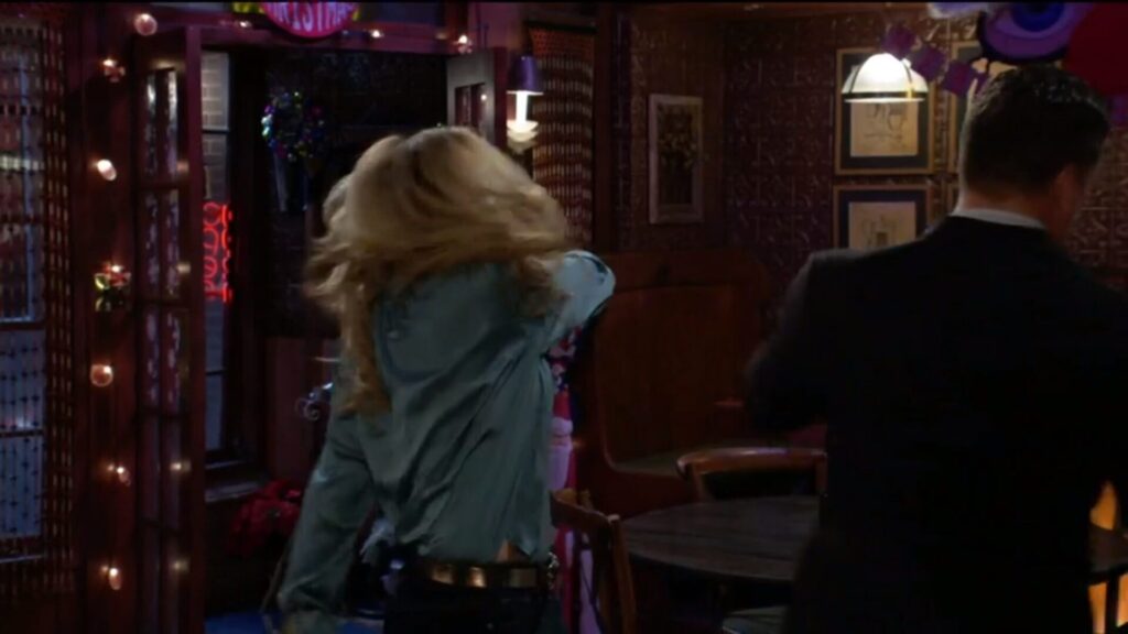 Sharon punches Nick.