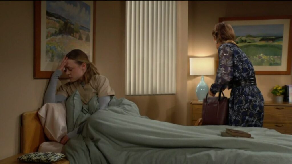 Claire turns away as Victoria gets her bag and leaves.