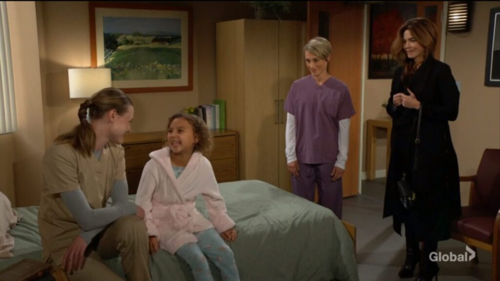 Claire and Nadia laugh together while the nurse and Victoria look on.