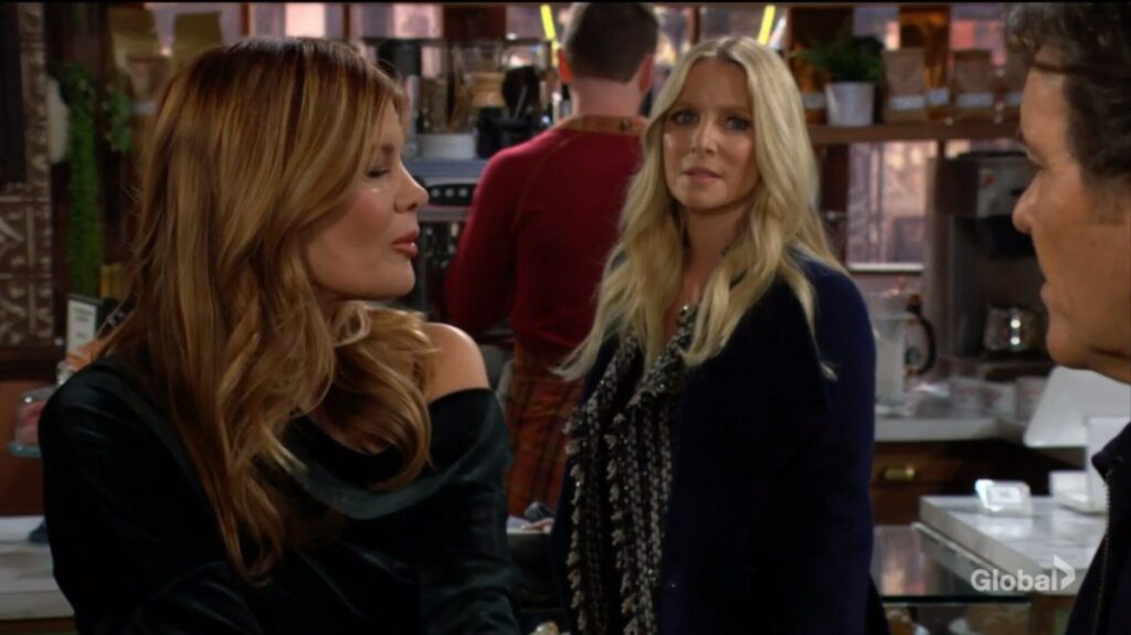 Phyllis talks to Christine as Danny looks on.