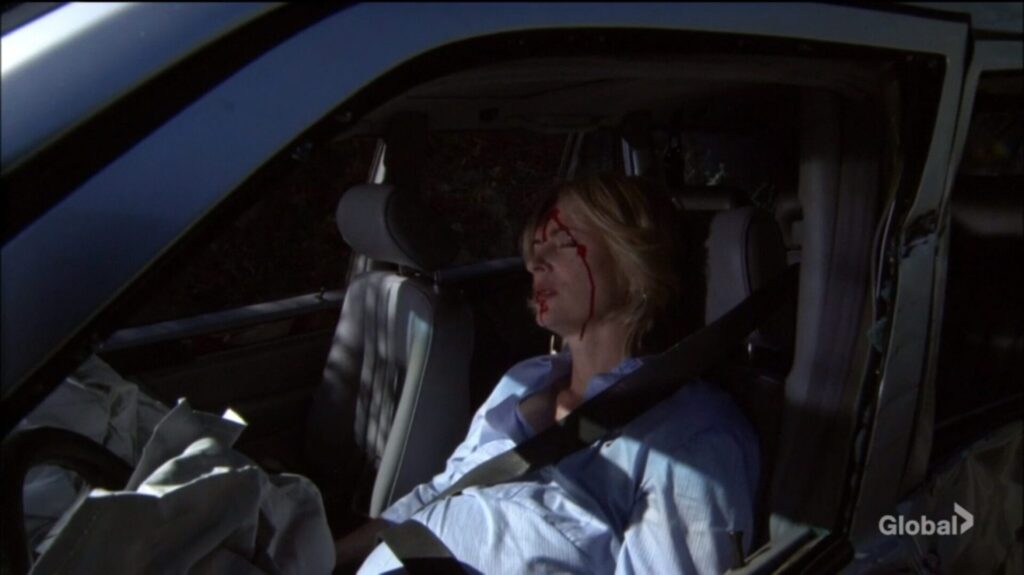 Ashley remembers a past car crash. She's bloodied and unconscious after being hit.