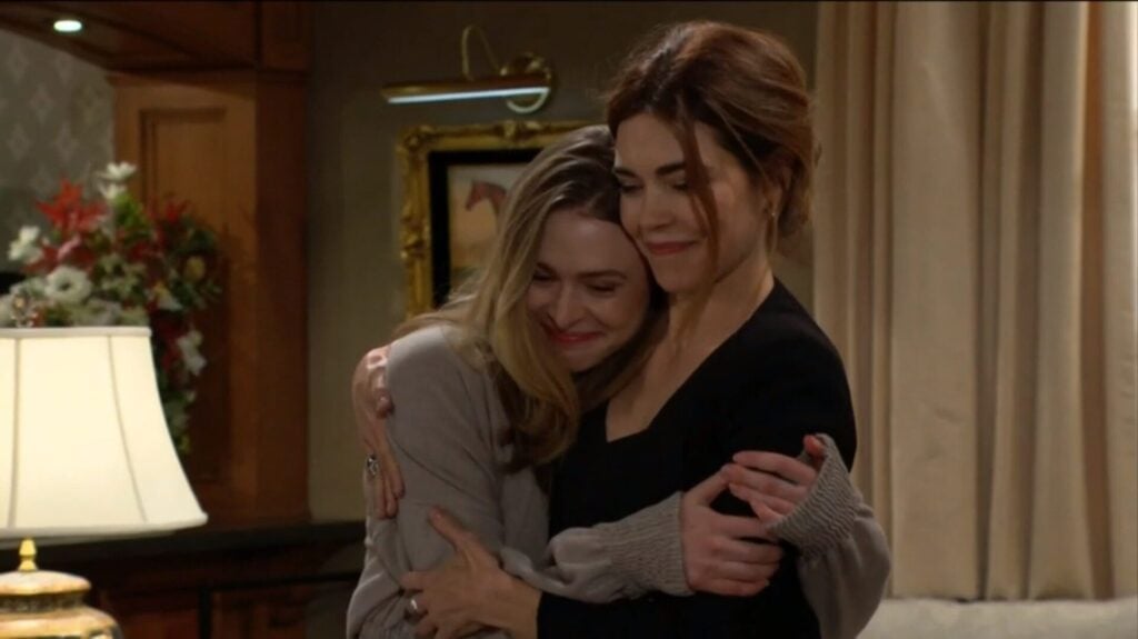 Claire and her mom, Victoria, hug.