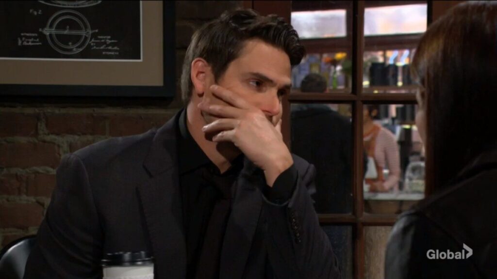 Adam rubs his face as he talks to Chelsea.