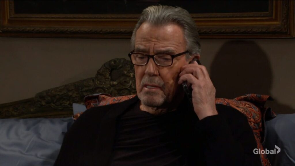 Victor Newman talks on the phone.