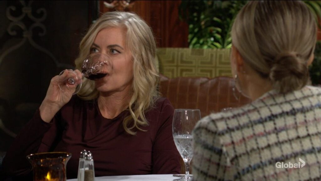 Ashley Abbott takes a drink of wine.