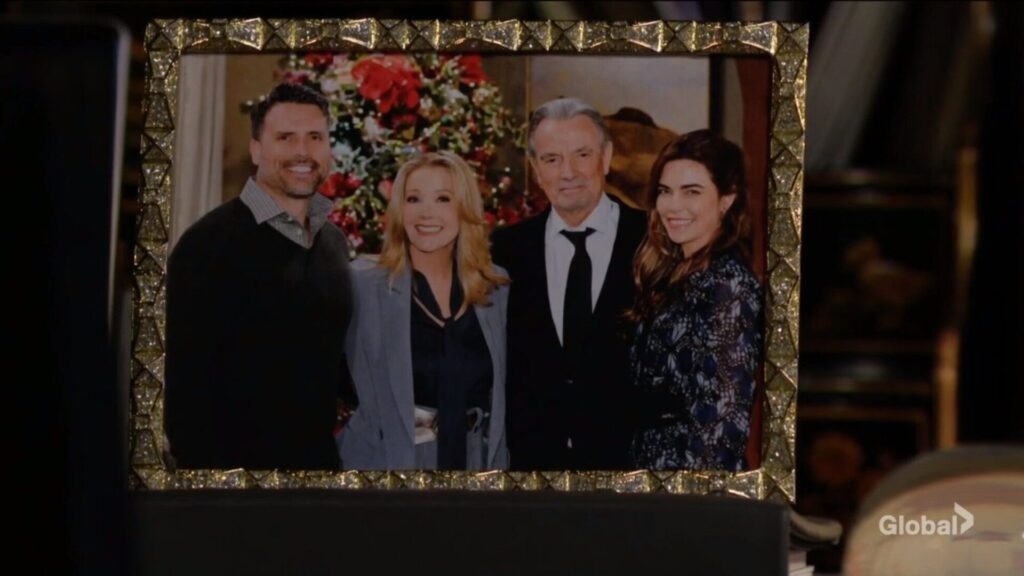 A framed photograph of Nick, Nikki, Victor, and Victoria Newman.