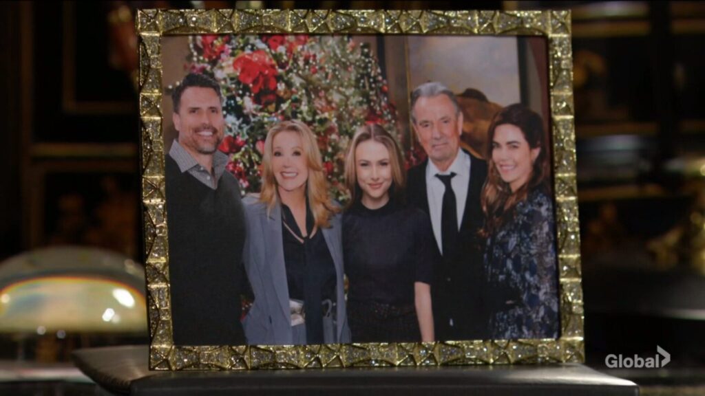 A framed picture of Nick, Nikki, Claire, Victor, and Victoria.