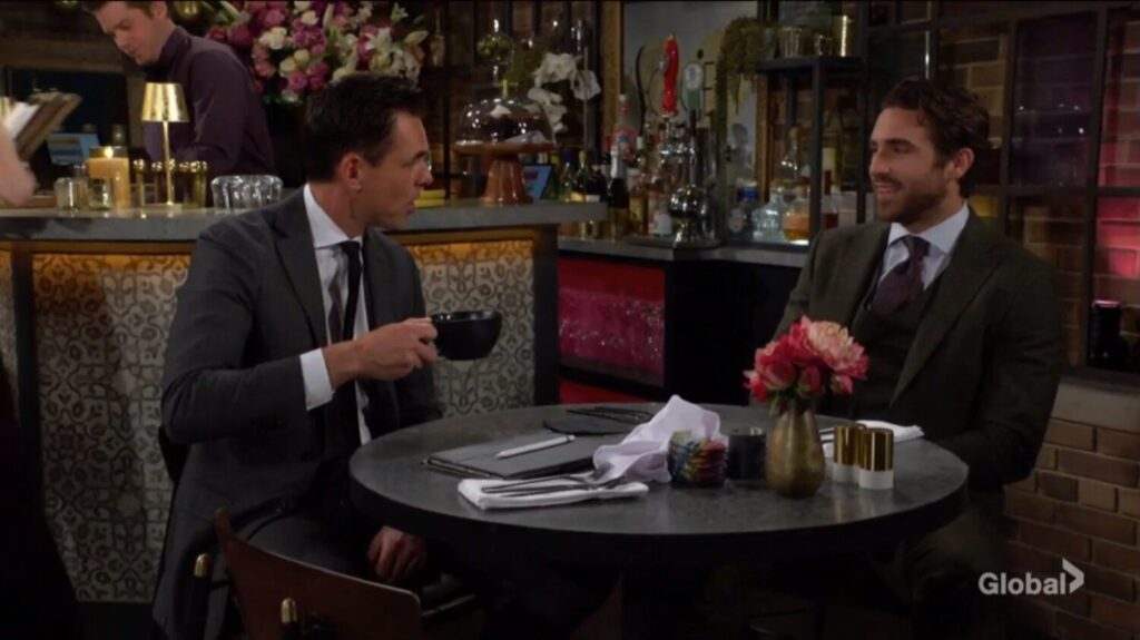 Billy Abbott and Chance Chancellor sit at a table and talk over coffee.