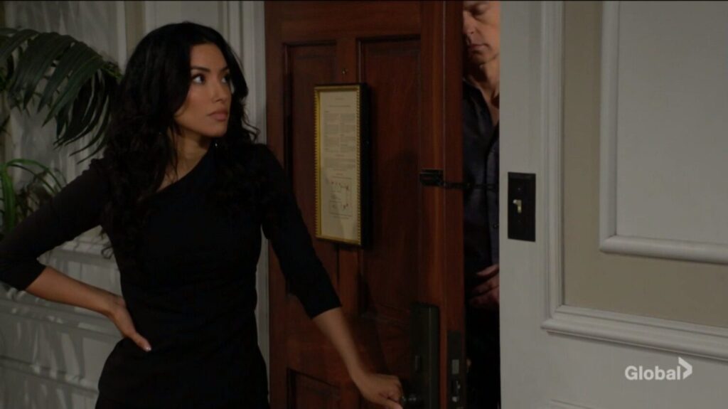 Audra and Tucker talk through her door.
