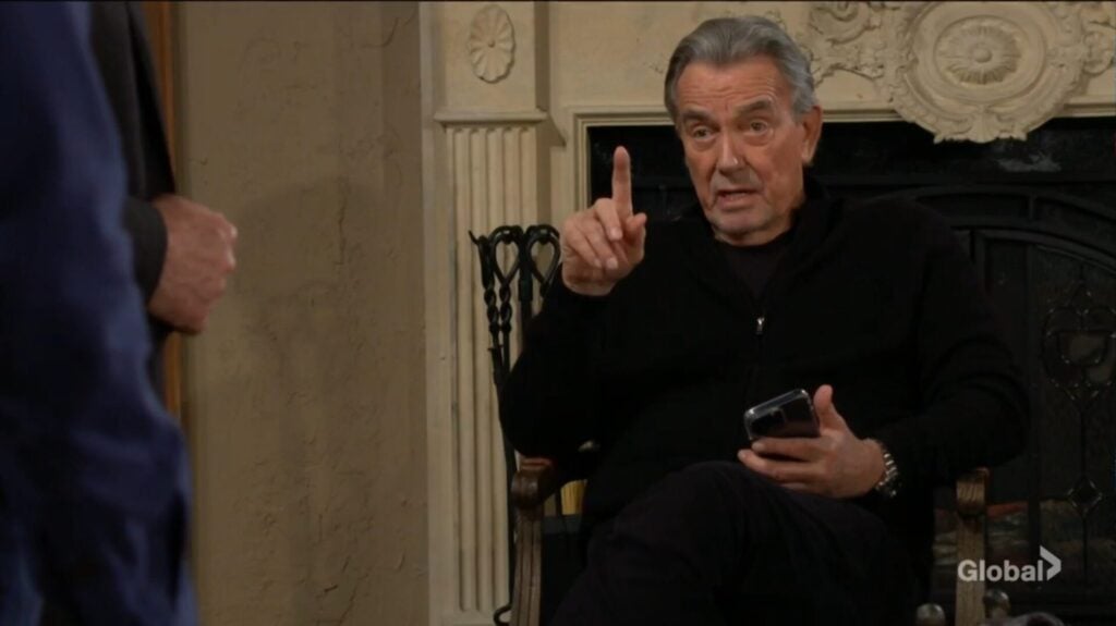 Victor holds up a finger as he talks with Jack and Kyle.