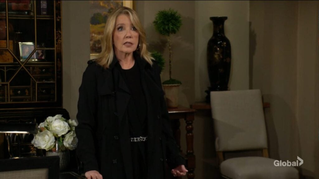 Nikki Newman enters the room.