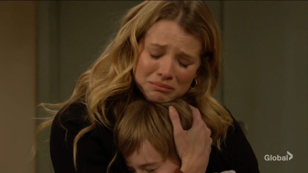 Summer cries as she hugs Harrison.