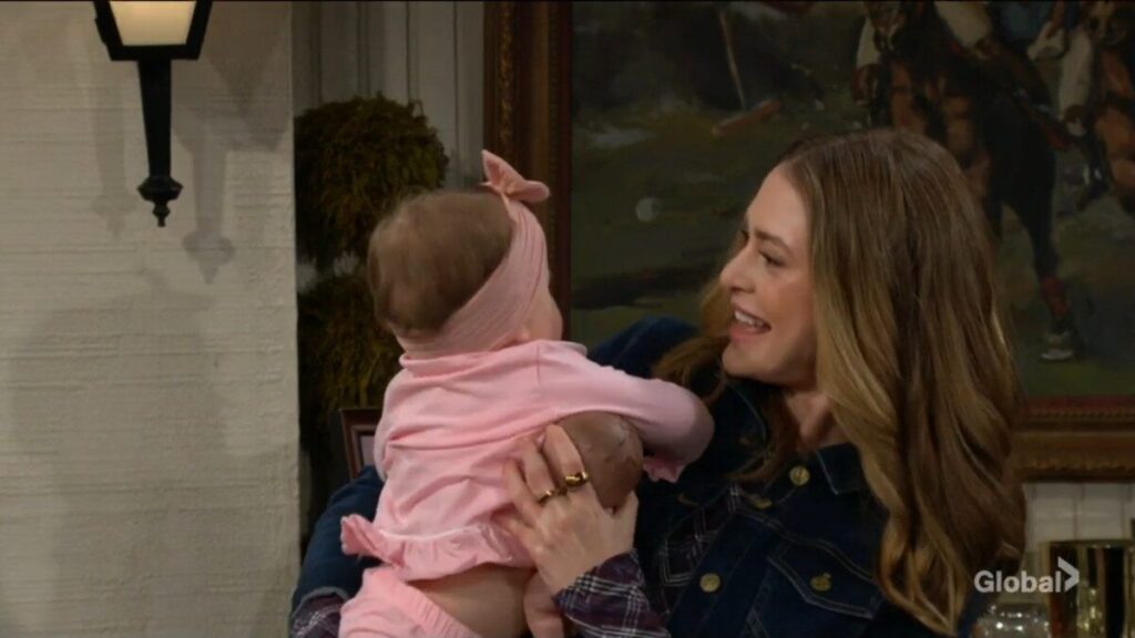 Claire holds Aria.