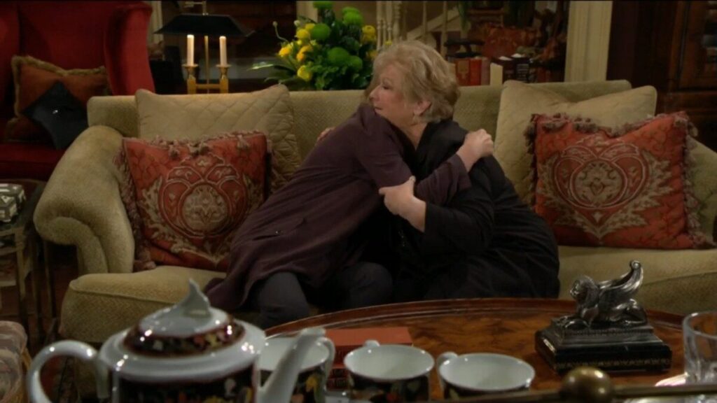 Traci and Ashley hug.