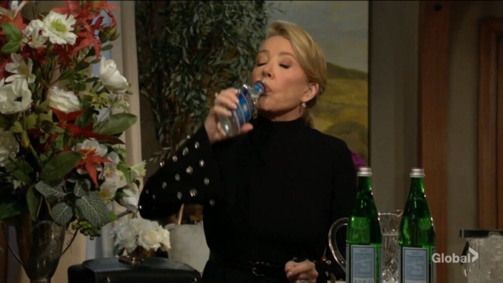 Nikki Newman drinks from her bottle of vodka.