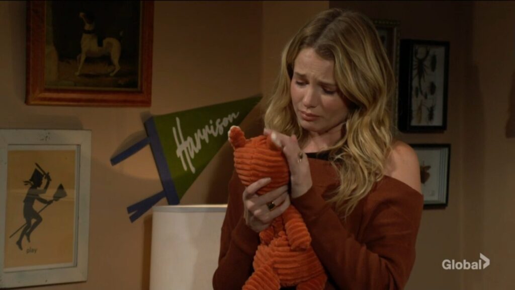 Summer holds Harrison's stuffed fox.
