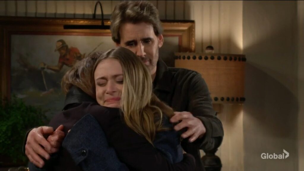 Claire Grace hugs her parents.