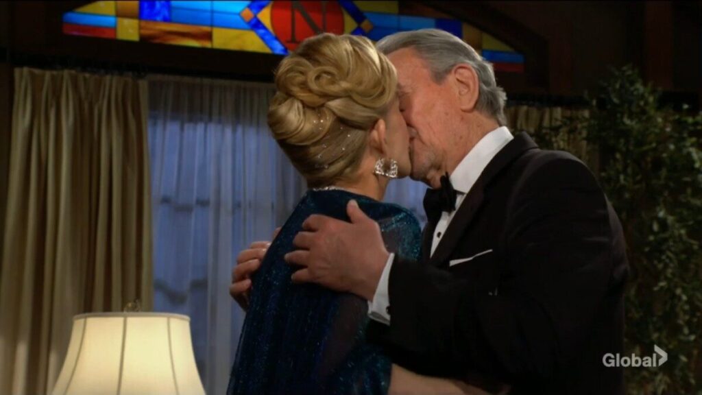 Nikki and Victor Newman kiss.