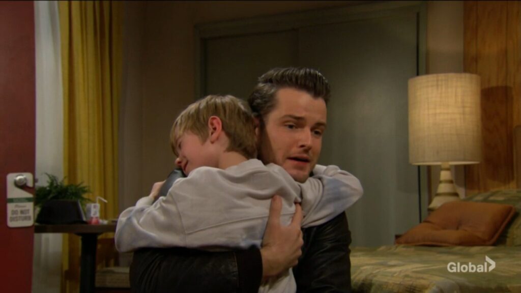 Harrison and Kyle hug.